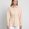 7 For All Mankind Faux Leather Cinched Waist Button Up Shirt In Nude