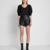 7 For All Mankind Faux Leather Tailored Short In Black