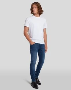 7 For All Mankind Luxe Performance Plus Slimmy Tapered In Mid-Blue -7 For All Mankind Shop 7T028393 MID 6